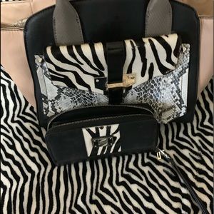 Guess purse and wallet selling as a set